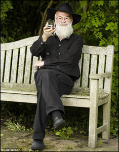 Terry and a glass of brandy in his garden