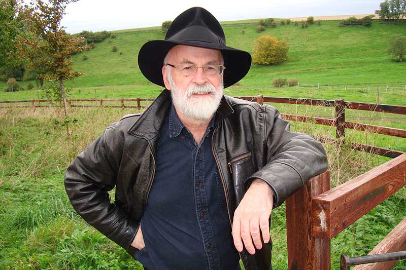 Terry Pratchett in a field